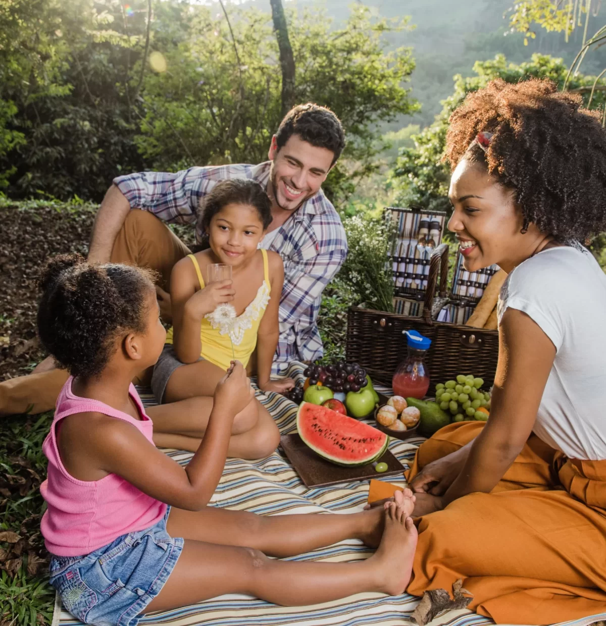 young-family-having-picnic-1-scaled.webp